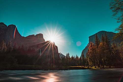 yosemite valley mountain near trees under blue sky at daytime landscape